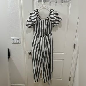 Women’s black & white striped jumpsuit size L